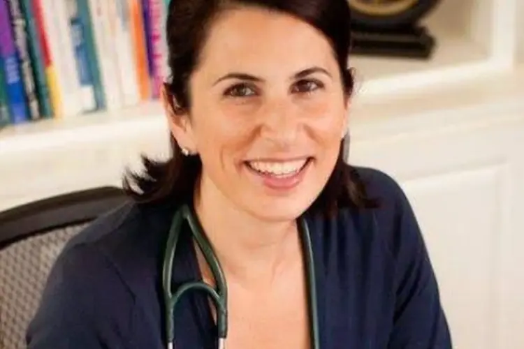 Dr. Samia McCully, ND with a stethoscope in her office