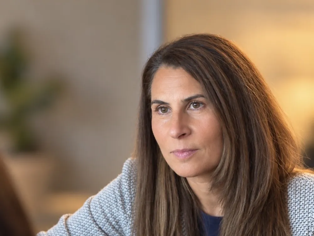 Dr. Samia McCully, ND in a thoughtful conversation with a patient