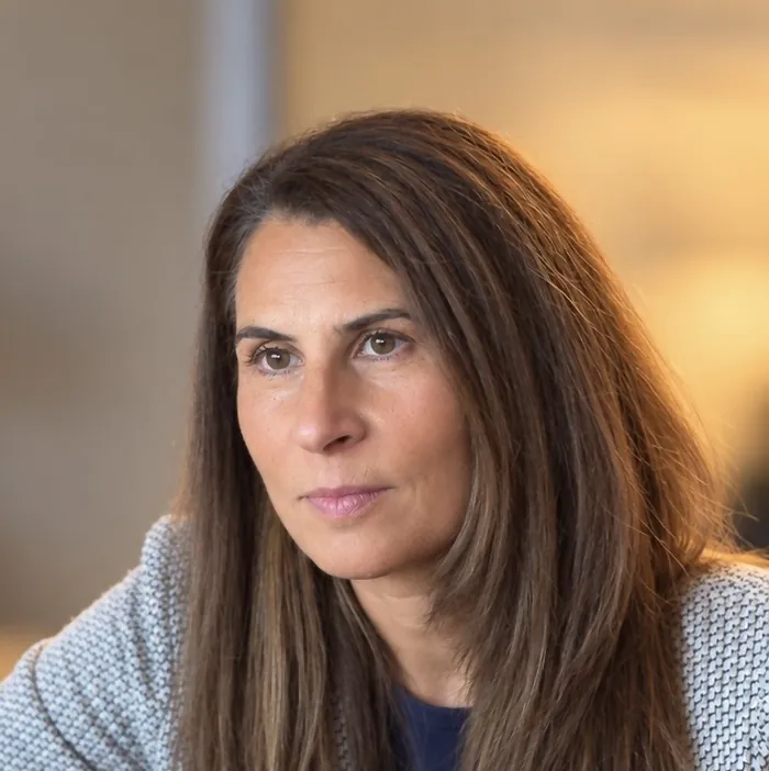 Dr. Samia McCully, ND in conversation with a patient