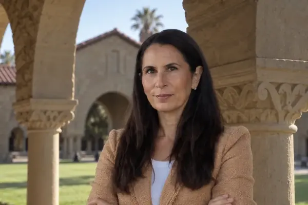Dr. Samia McCully, ND standing beneath sandstone arches